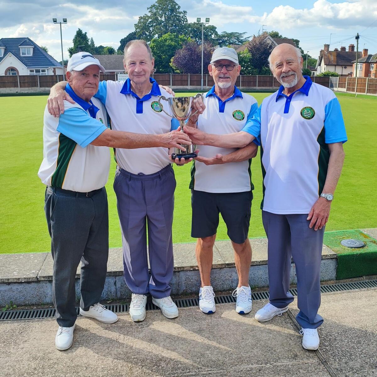 Champions and runners up celebrating together.