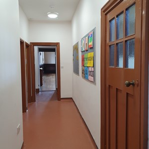Corridor from kitchen to back and main halls