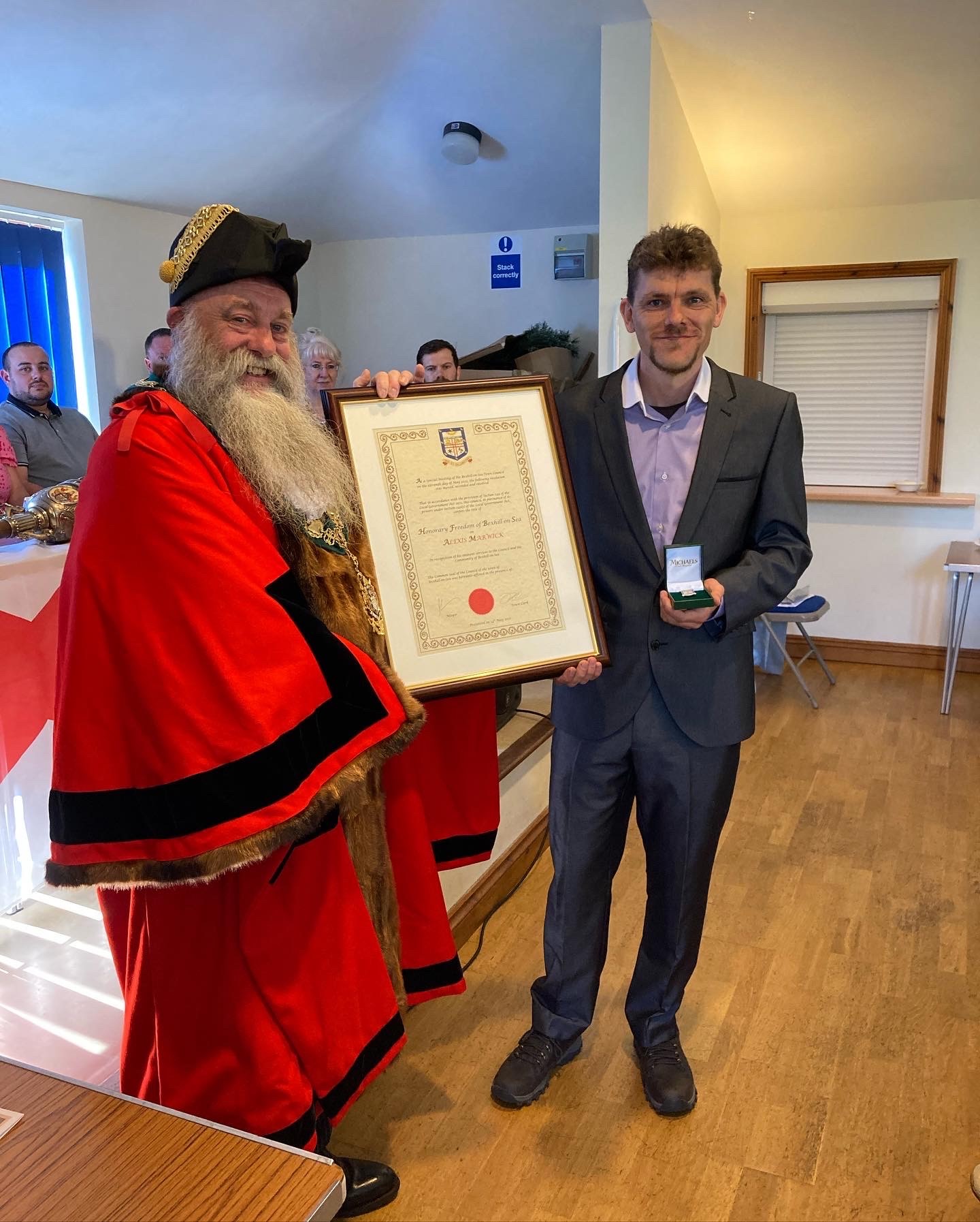 Alex receiving the Freedom of Town from Cllr Paul Plim, Town Mayor