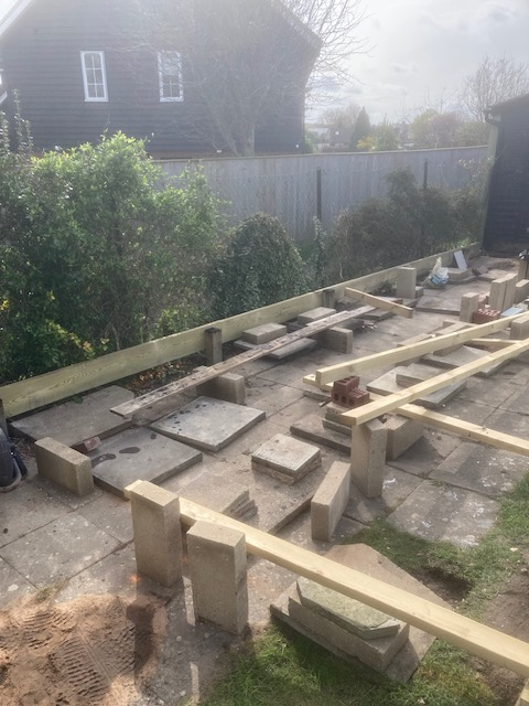 Back boards in place, ready to take joists.