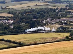 While stopping for coffee, we watched the steam train on its way to Swanage; also our destination. ©RW