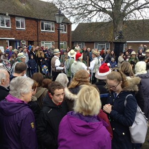 Families watch morris dancing at The Allens