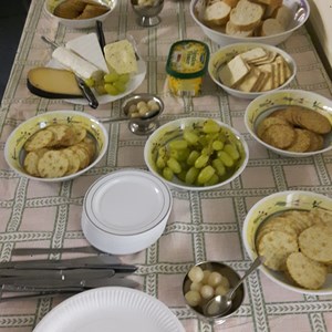 A delicious spread of cheese, crackers and pickles
