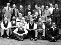 Handcross Bowling Club with some silverware on the table, circa 1920.