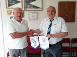 President Mal Croson exchanging pennants with Grimsby 23rd June 2018