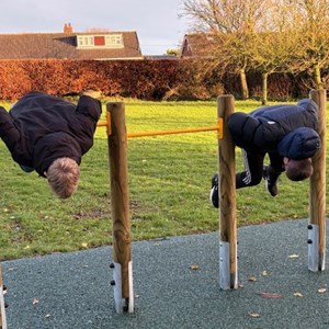 Young people getting in an early go on the Roll Over Bars