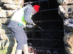 Claring the grotto of rubbish