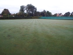 The green prior to work commencing to re-lay it in September 2017