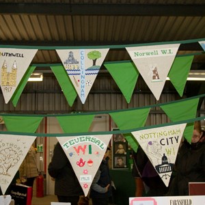 A section of pennants by other WI's