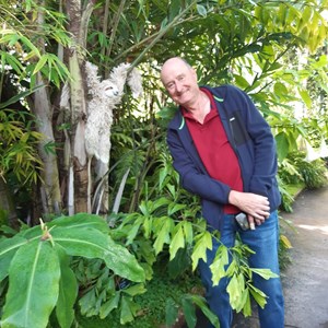 Peter smiling at a sloth??
