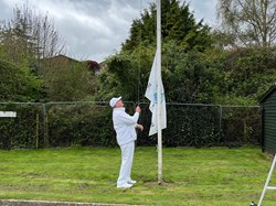 Raising the Club flag