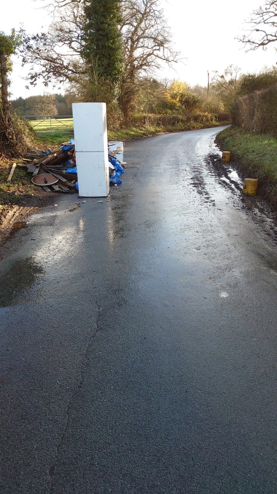 Fridge and rubbish dumped in the road in Birling