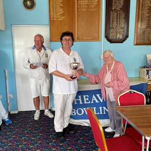 Steve Hawkins receiving the Howe Cup 2023 from Jean Williams