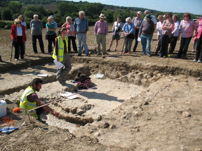 Cotswold Archaeology Project Leader Matt, explaining the different levels of trench 4 – possibly the main villa entrance