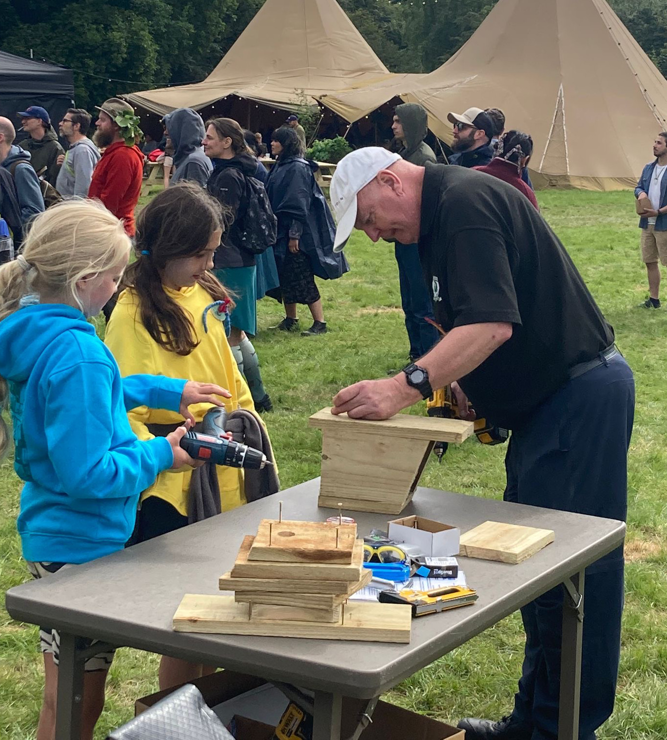 Young makers get involved in bird box making at the Timber Festival