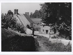 View looking down Church Hill to The Dolls House (Berry Hill Cottage); on L, Mrs Pottinger's House and Amberley, 1937