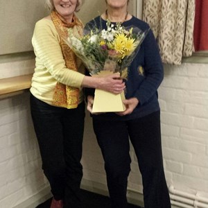 A thank you gift to our long-serving bookings secretary Sheena (r) from Chair Lally