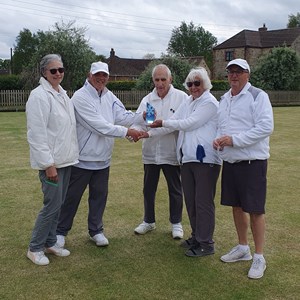 Australian Pairs Day runners up Liz Dyer & Bruce Acock presenting trophy to winners Gail Robertson, Annette Oliver & Richard Lambert (Gail & Annette shared a place)