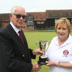 Ladies singles: President Reg Turner presenting the cup to Nicky Wilsher