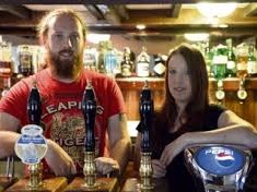 Sandy and Sarah behind the bar