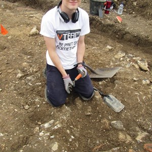 Tom slogging his way through fallen debris near the stoke hole – the central heating boiler for the villa