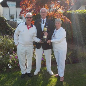 Mixed Pairs: Pauline Lines and Colin Marsden receiving their cup from President Richard Stocking