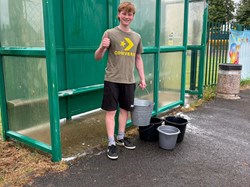 cleaning the bus stop