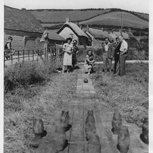 Skittles in village hall ground .