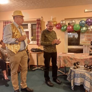 Barry Wright introducing Angus Mullin who is about to Present the Triples Trophy