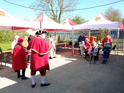 The Mayor & Town Crier welcoming the first group of children