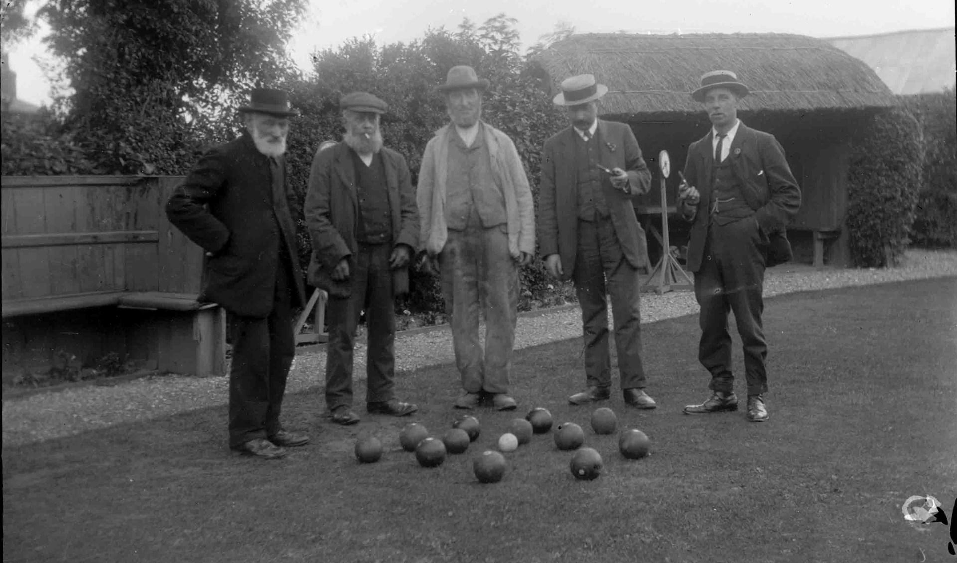 Club members enjoying a game on the bowling green around 1910