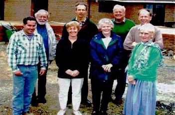 “Something to smile about” The project team with the builder of the new Bodle Street Green Village Hall. Neil Hammond (front left)
