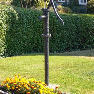 Pump at thatched cottages
