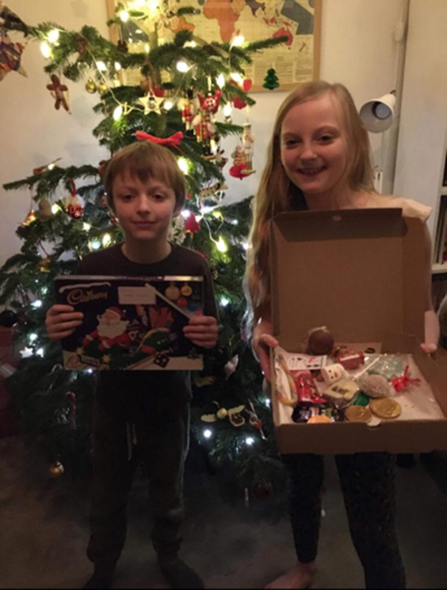 Pearl and Ralph enjoying their Christmas boxes