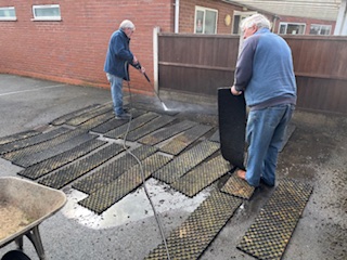 Cleaning the bowling green ditch liners