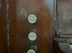 Stop knobs on the side of the case