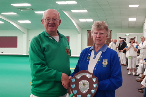 Captain Jean Sheldon collecting the Trophy from Ray Hills