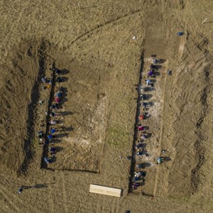 The mosaic trench (2) is on the left. The righthand trench is through the middle of the villa Men and women at work!