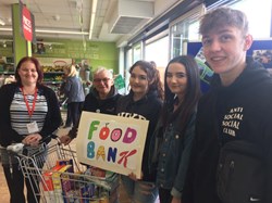 Young people collecting for the Food Bank at the Coop in Stoke
