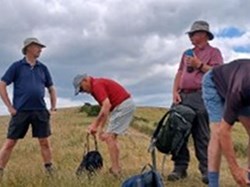 A breather with drink stop was very much needed at the trig point . . . ©EH