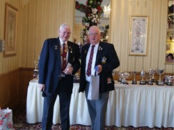 President Brian Smith (left) presenting Vice President Joihn Ball for his work during the year liasing with the builders and Viridor Credits who granted the Club the money for the building project.