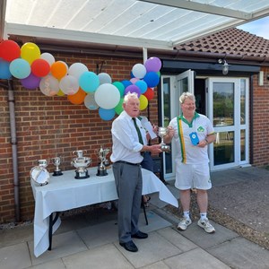 24/ Ian Kirsch with the Men's Handicap Trophy