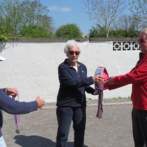 Ian presenting Alison with he prize