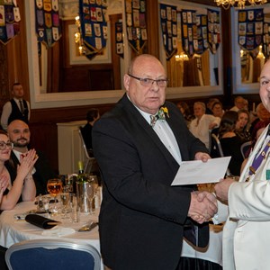 Lion Harold Bowen receiving 20 Years Service Chevrons