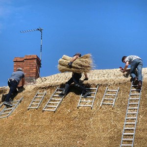 May 7th      THATCHERS AT WORK  A couple of years ago The Cottage was rethatched. Want to know how they did it?   Just download the thatching leaflet from the village page of our website to find out