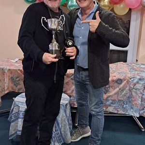 Mens Championship winner Martin Taylor being presented his Trophy by Paul Ugo