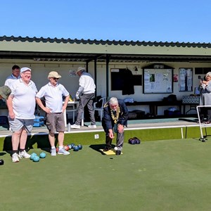 April, County President Alex Lowe bowls the first wood.