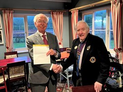 Lion Brian recieving his 35 year award from DG Barry