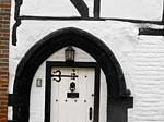 A doorway in Vicarage Lane. A survivor of the French sacking of the town in the 15th century.