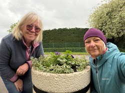 Volunteers maintaining our planters
